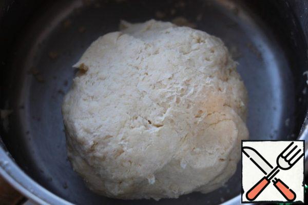 Grind cold butter with flour into crumbs, add cold water and roll the dough into a ball, do not mix for a long time.
