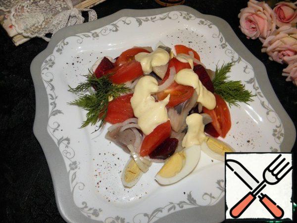 Season with spices, pour over the dressing and serve
