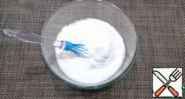 Add flour and baking powder, mix.

