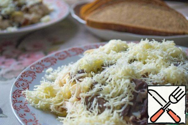 Add ready-made mushrooms to our salad and sprinkle with cheese, grated on a fine grater. Serve warm.
