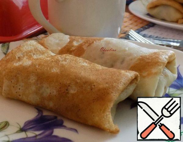 Pancakes Stuffed with Cabbage in Sour Cream Recipe