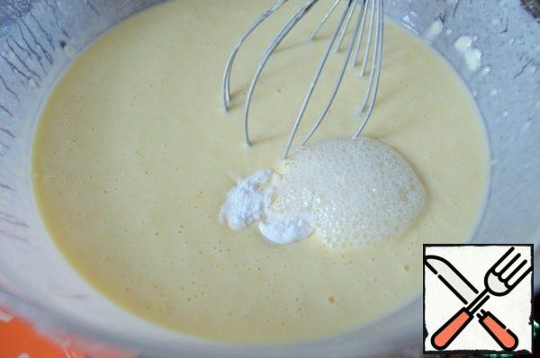 Add soda and lemon juice, mix.
Pour in the vegetable oil and mix again.
