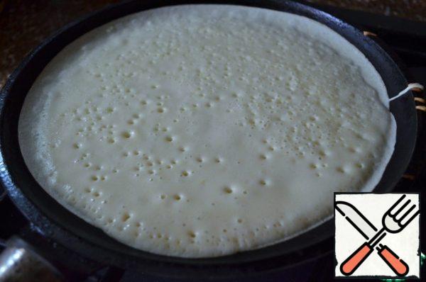 Bake in a pancake or cast-iron pan for 1-1.5 minutes over medium heat.
