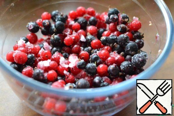 Lightly defrost the assorted berries.
