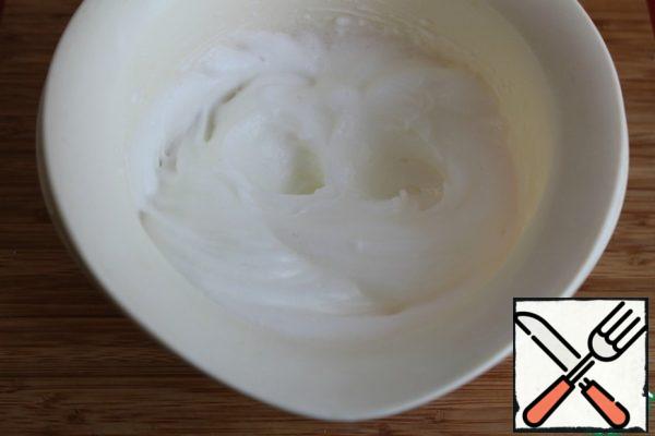 Whisk the whites with a pinch of salt until peaks form.
