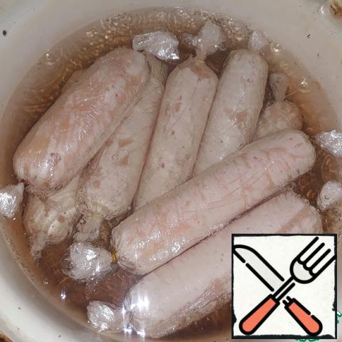 Cook in boiling water for 5 minutes. You can eat like this, but you can also fry. It is also convenient to freeze for later.
From these ingredients came out 8 pieces of 50 grams. One sausage has 62.3 calories, 12.7 proteins, 1 fat, 0.8 carbohydrates. They are very gentle and useful.
Bon appetit!