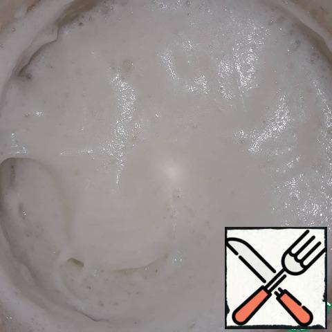 Beat cold egg whites with a mixer until white foam;