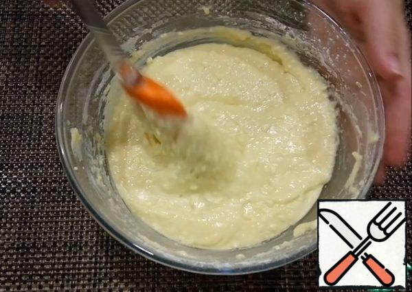 Add flour and baking powder. Mix it.