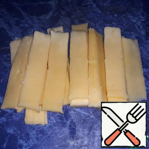 Cut cheese slices;