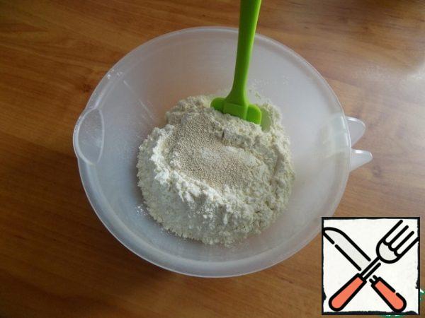 Today I'm going to do the yeasted pastry. Mix in a bowl of dry ingredients: flour, sugar, salt and yeast.