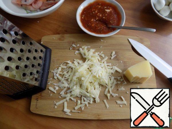 Parmesan grated on a medium-sized grater.