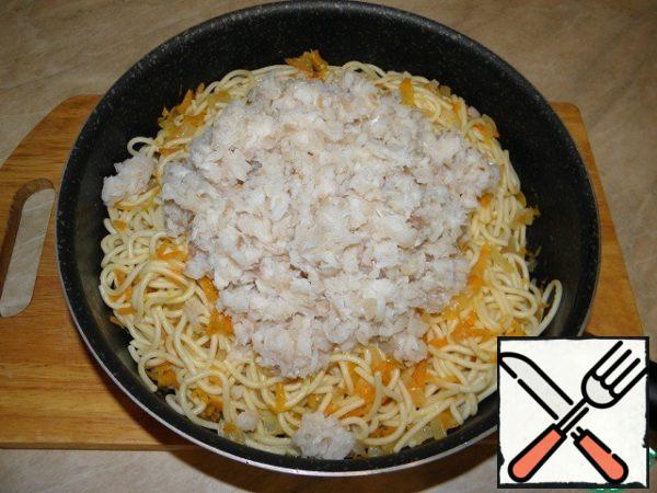 Add the pasta to the fish