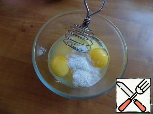 Sugar, vanilla sugar, baking powder and eggs combine whisk.