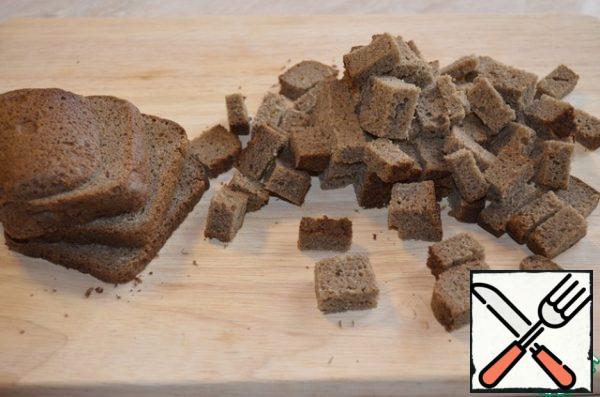 Cut Borodino bread into small cubes.
In a bowl, mix all the ingredients: cherry tomatoes, olives, eggs, bell pepper, bread, cabbage.
Put the salad on a plate from this amount, I got 4 large portions.
Season each serving with a quarter of lime, olive oil, and sprinkle sesame seeds on top.
If desired, grate the hard cheese on a fine grater.