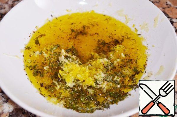For the marinade: pour lemon juice in a thin stream into the olive oil, whisking. Add garlic, zest, thyme, salt and pepper.
