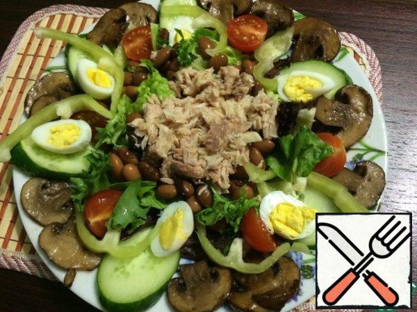 Cut the eggs into halves, spread them on cucumbers, and put mushrooms on the edge. Pour olive oil over everything.

Add salt to taste.