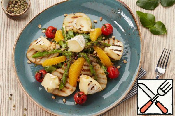 When serving, sprinkle the dish with pine nuts.