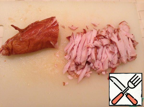 Cut the breast into strips.
