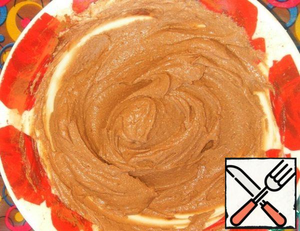 Add cocoa and 1 tsp sugar to the remaining curd mass. Mix well.
