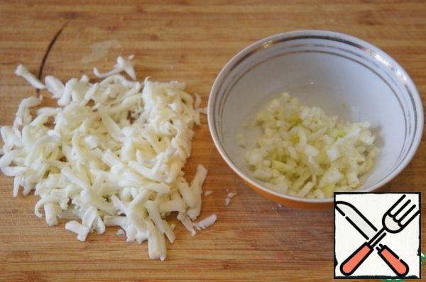 Cheese to grate on a large grater. Mix the remaining finely chopped fennel with grated cheese.