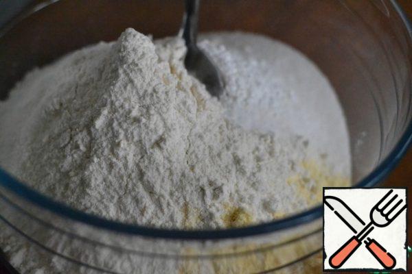 In a bowl, mix corn and wheat flour, dough baking powder, sugar. Stir.