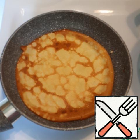 Fry the pancakes as usual on a frying pan on both sides.