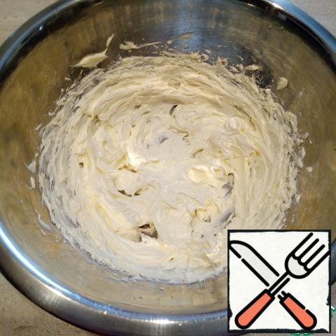 Soft butter lightly beat until white. All components of the cream should be the same temperature, no sudden changes!