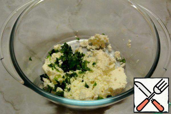 In the curd add finely chopped coriander or dill.