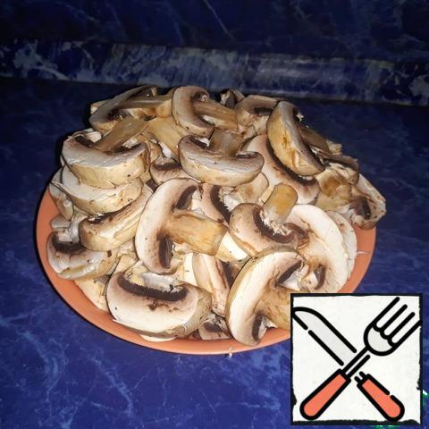 Cut the mushrooms into strips and simmer until tender (5 minutes).