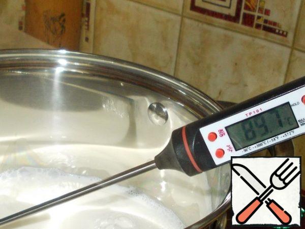 Heated to a temperature of 90 degrees. If no thermometer, it is almost to a boil.