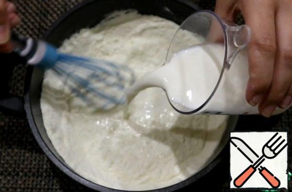 Gradually add the milk stirring constantly to avoid lumps.