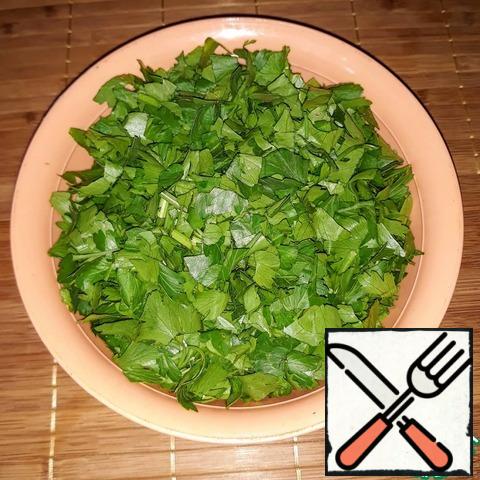Chop parsley.