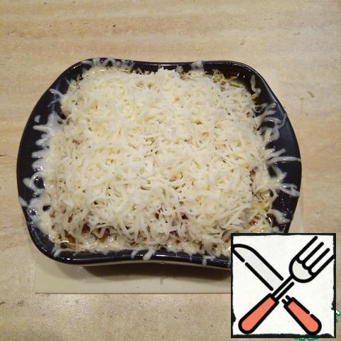 Then sprinkle with grated cheese and bake for another 10-15 minutes.