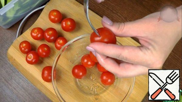 Cherry tomatoes are more dense, so I take them. I pierce with a fork in 2-x-3 places.