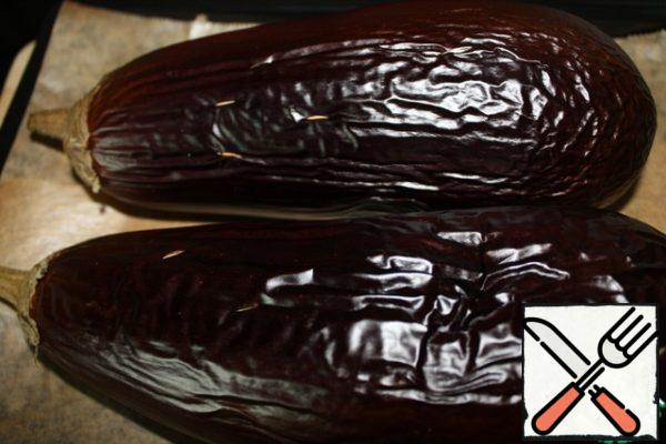 Pierce the eggplants with a knife and bake at 200 degrees for about 40 minutes.
I had big eggplants, and I baked them longer.
