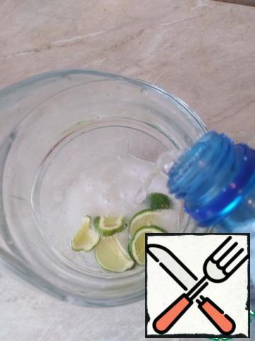 Pour mineral water into the jug.