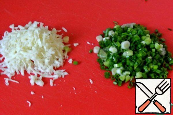 Cheese to grate on a large grater. Finely chop the green onions.