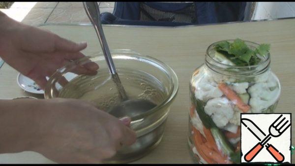 When the marinade has cooled pour vegetables with marinade under the top and close the lid. Vegetables should stand for about four hours, then put them in the refrigerator at night, the next morning they are ready. They are stored about 3 weeks. If you do for the winter, then add 2-3 aspirin tablets to each jar and close. Instead of aspirin, you can sterilize the cans for 20 minutes, but then the vegetables will not be so crispy. Bon appetit!
