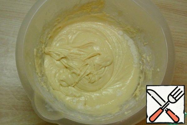 Pour the sifted flour with baking powder. Gently mix. You can stir it with a mixer on low speed.