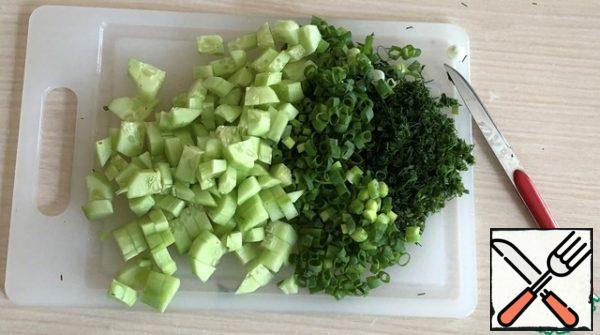 Cucumber clean and cut into small cubes, dill and green onions finely chop. We are all ready for the final stage!