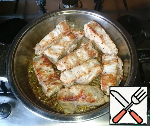 Fry on each side. Just a little crust. It is very easy to check. Take a piece and if it comes off the pan - turn over to the other side.