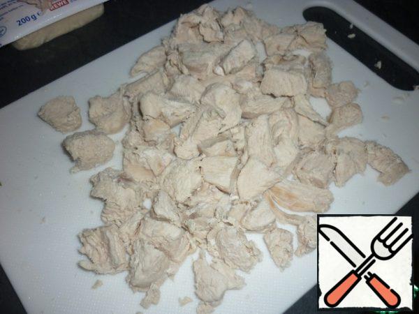 Cook the chicken, cut into small pieces and let cool.

