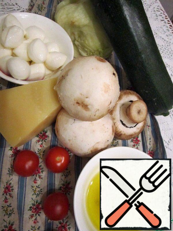 Basic ingredients.Preparing the gas station. Grind garlic, grind with salt and sugar, add lemon juice and olive oil.