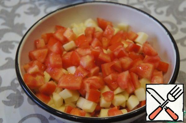 Tomatoes cut in half, remove seeds, cut into cubes.