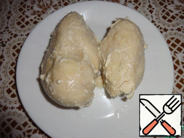 Boil the chicken breast.
