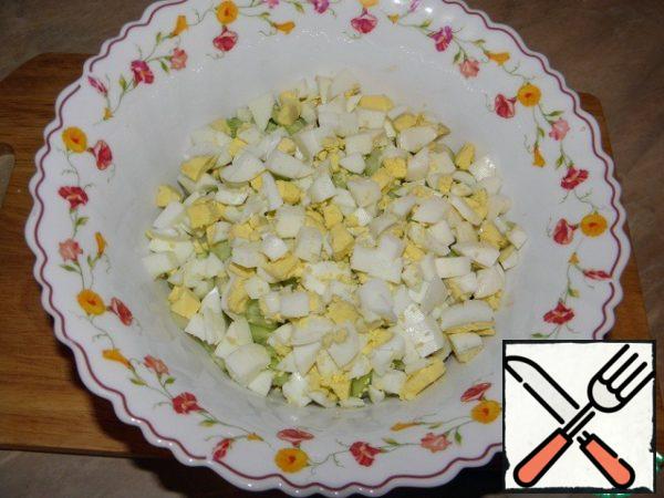 Eggs (pre-cook) cut into cubes, add it to the chicken and cucumbers .