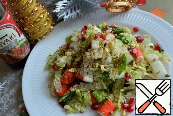Season the salad, mix well.
Put a slide on a serving dish.
Before serving sprinkle with chopped pistachios and pomegranate seeds.