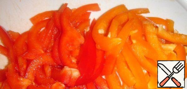 Pepper (I had red and half an orange) cut into strips.
