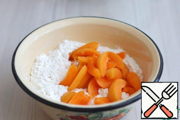 Apricots cut into slices/pieces. Add apricots to dry ingredients.