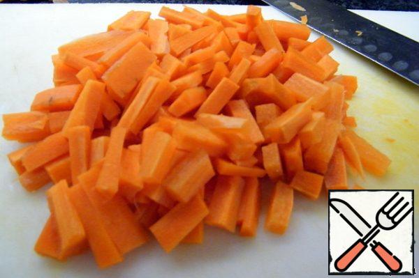 Carrots cut into strips, about as for pilaf.
